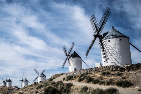 Don Quixote by Miguel de Cervantes. It was originally published in two parts, in which years?